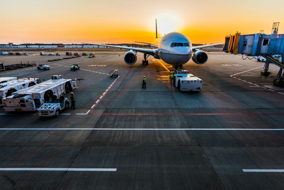 Gray Airplane on Parking
